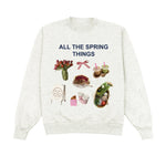 Sweatshirt with spring-themed graphics and text on a white background