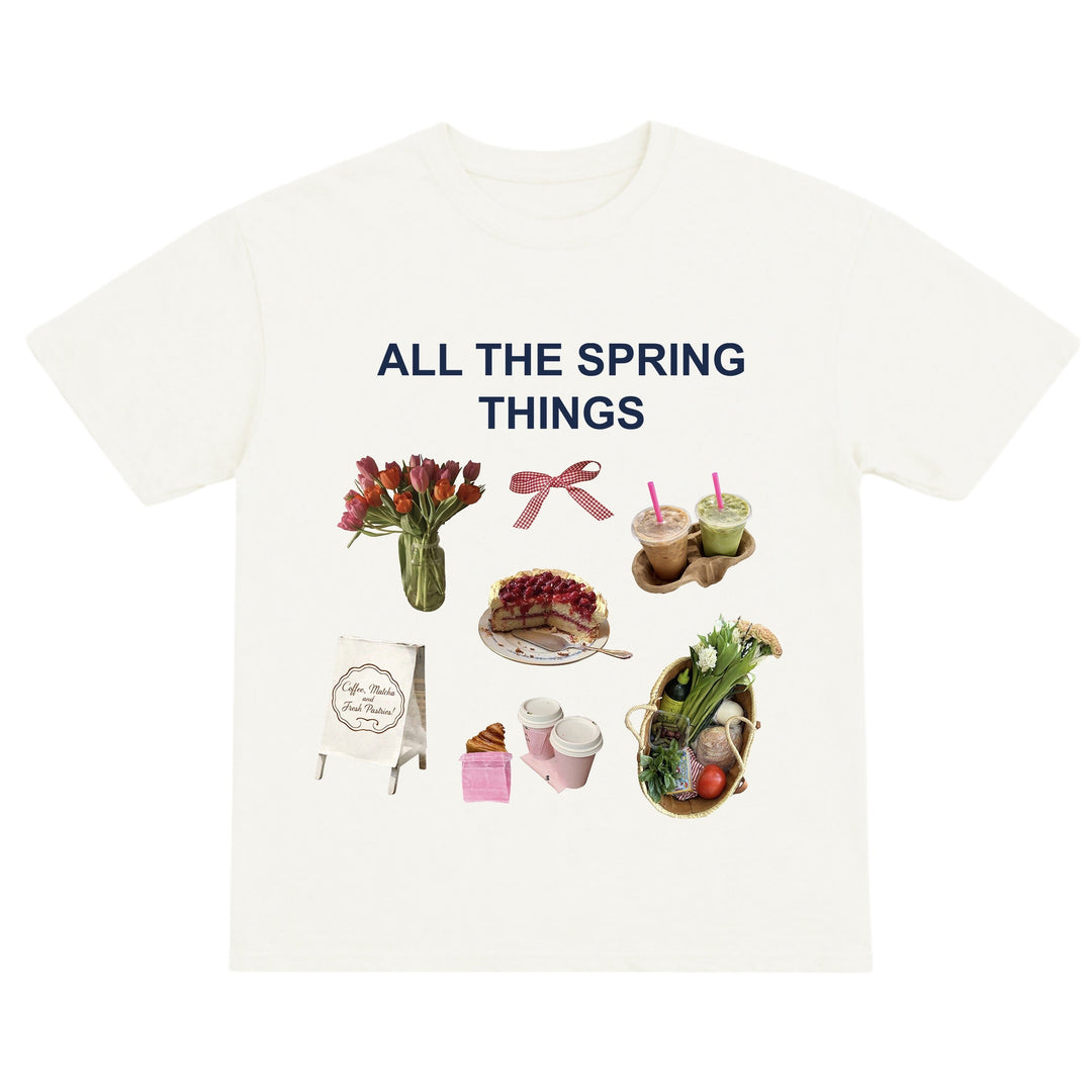 White t-shirt with spring-themed graphics and text on a white background
