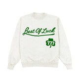 White sweatshirt with green text 'Best Of Luck' and clover graphic on a white background