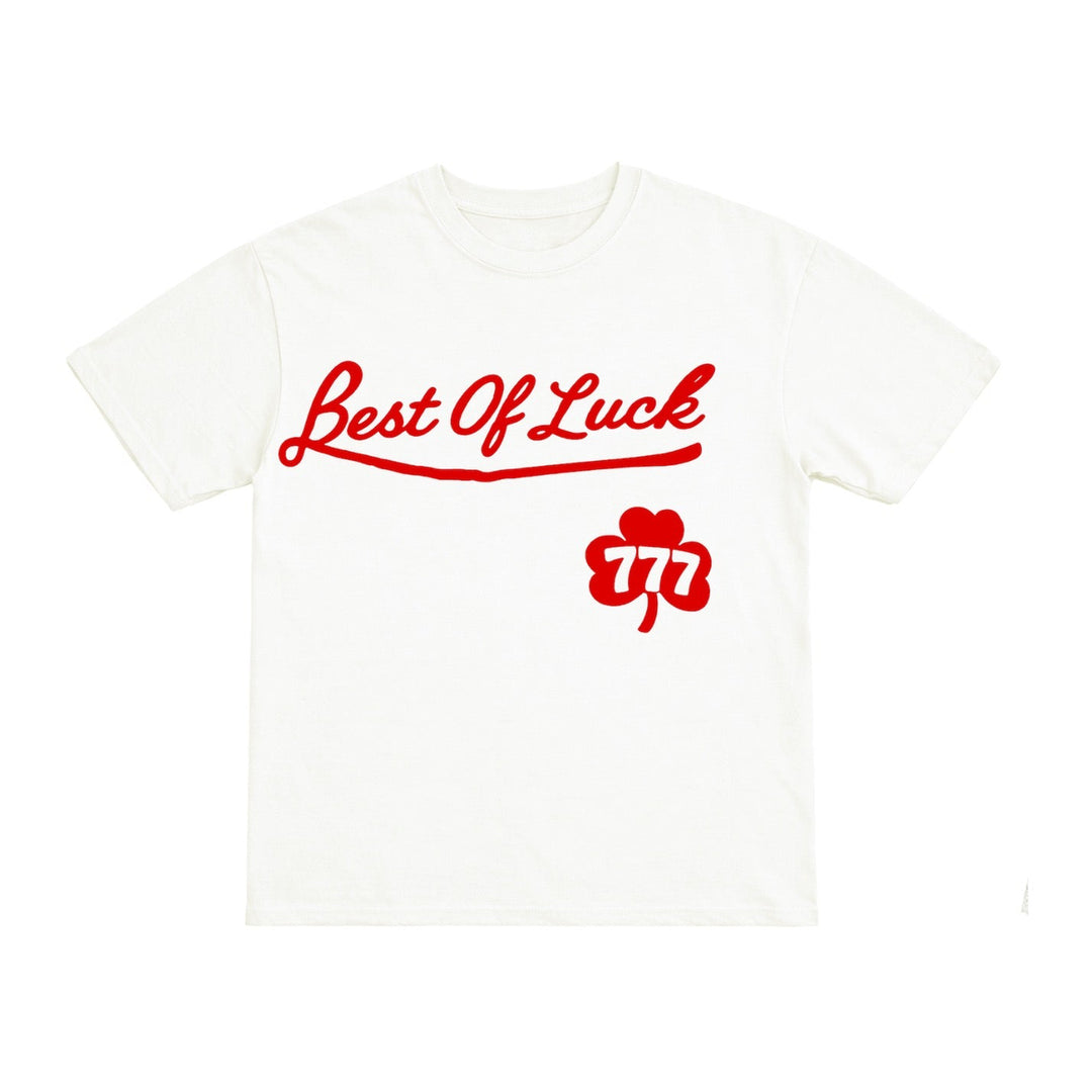White t-shirt with red text and clover design on a white background