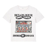 White t-shirt with a graphic design of a slot machine and text on a white background