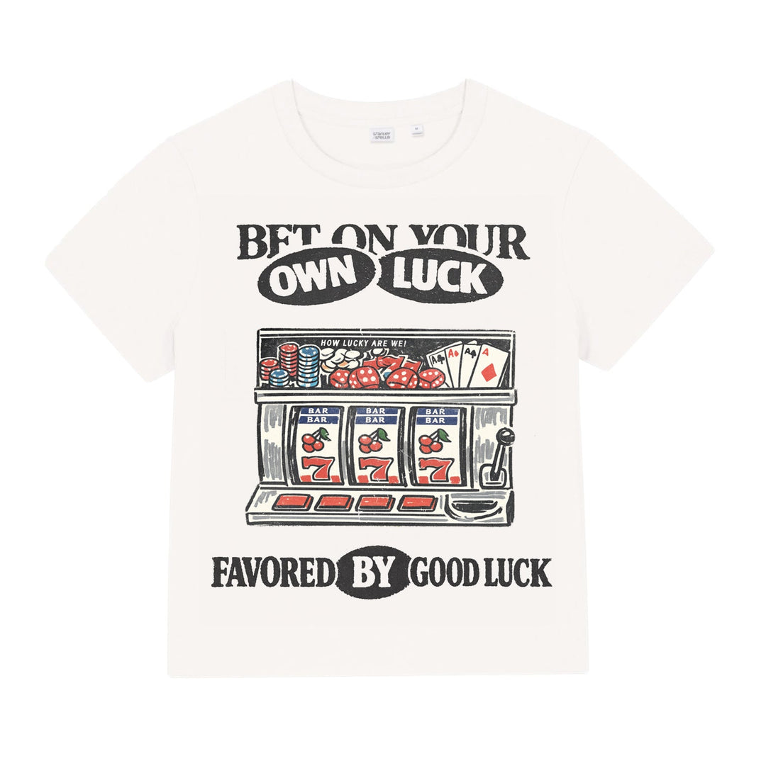 White t-shirt with slot machine graphic and text on a white background