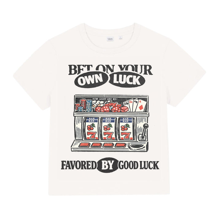 White t-shirt with slot machine graphic and text on a white background