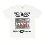 White t-shirt with slot machine graphic and text on a white background