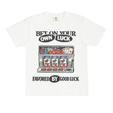 White t-shirt with slot machine graphic and text on a white background