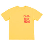 Yellow t-shirt with 'Call Your Mom' text in red on a white background
