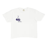 White t-shirt with a small graphic on a white background