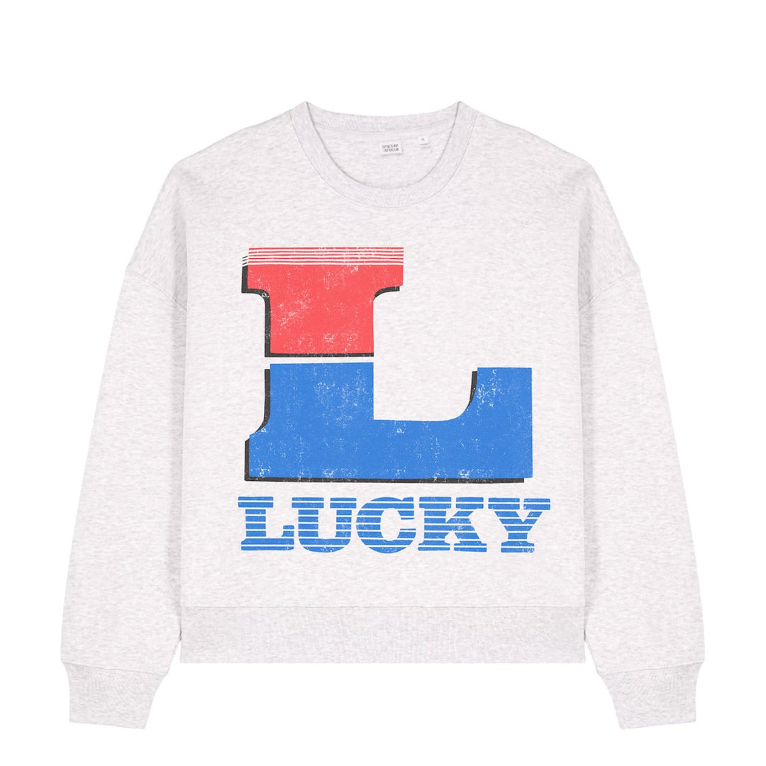 White sweatshirt with a large red and blue 'L' and the word 'LUCKY' on a white background