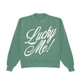 Green sweatshirt with 'Lucky Me!' text on a white background