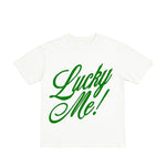 White t-shirt with green 'Lucky Me!' text on a white background