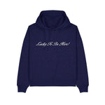 Navy blue hoodie with 'Lucky To Be Here!' text on a white background