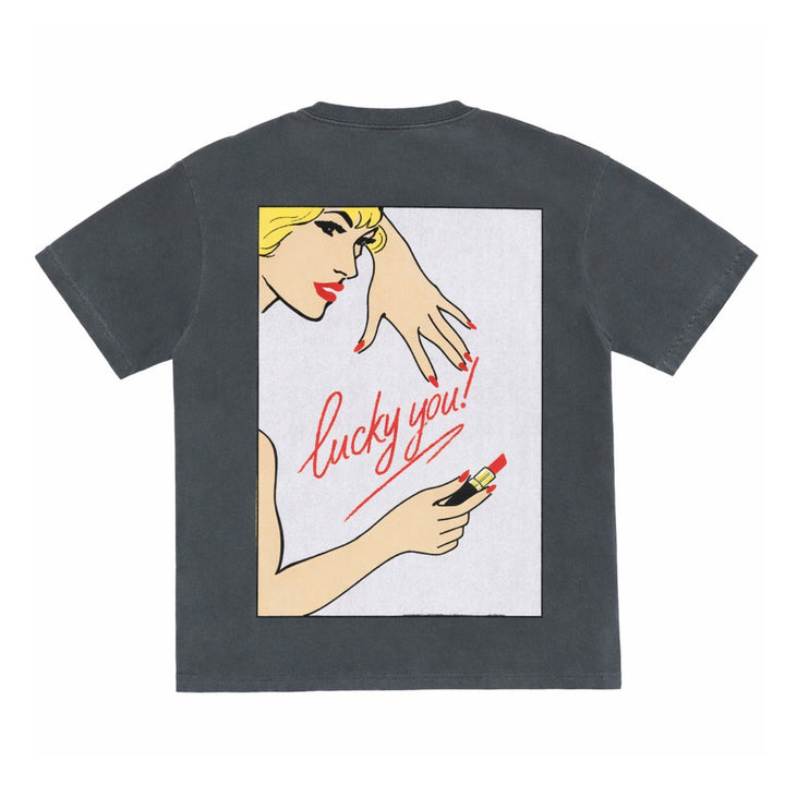 Black t-shirt with graphic design of a woman, hand, and lipstick on a white background