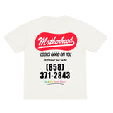 White t-shirt with red and black text on a white background