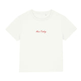 White t-shirt with red text on a white background