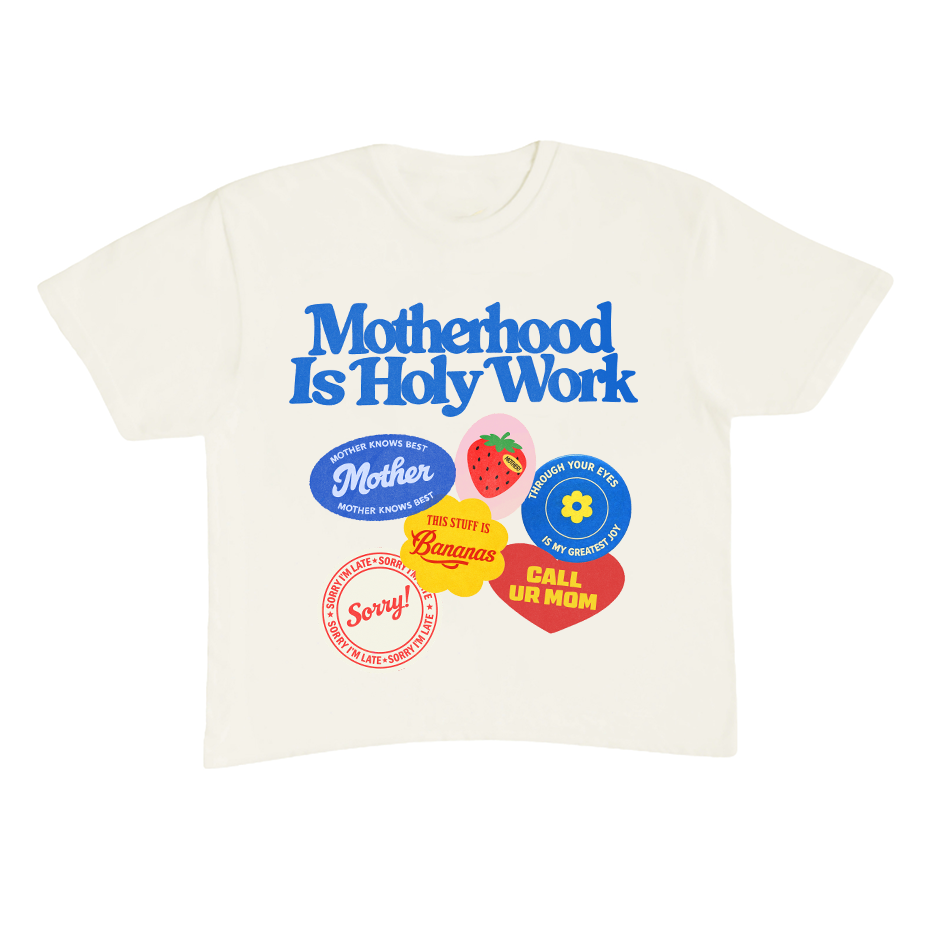 White t-shirt with colorful graphics and text on a white background