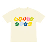 Beige t-shirt with colorful text design on a white background