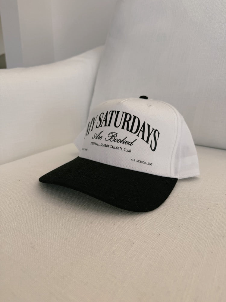My Saturday's Are Booked Trucker Hat