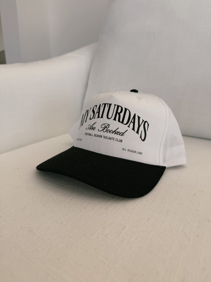 My Saturday's Are Booked Trucker Hat