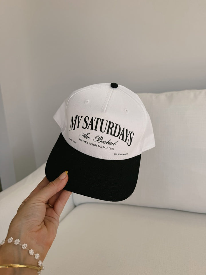 My Saturday's Are Booked Trucker Hat