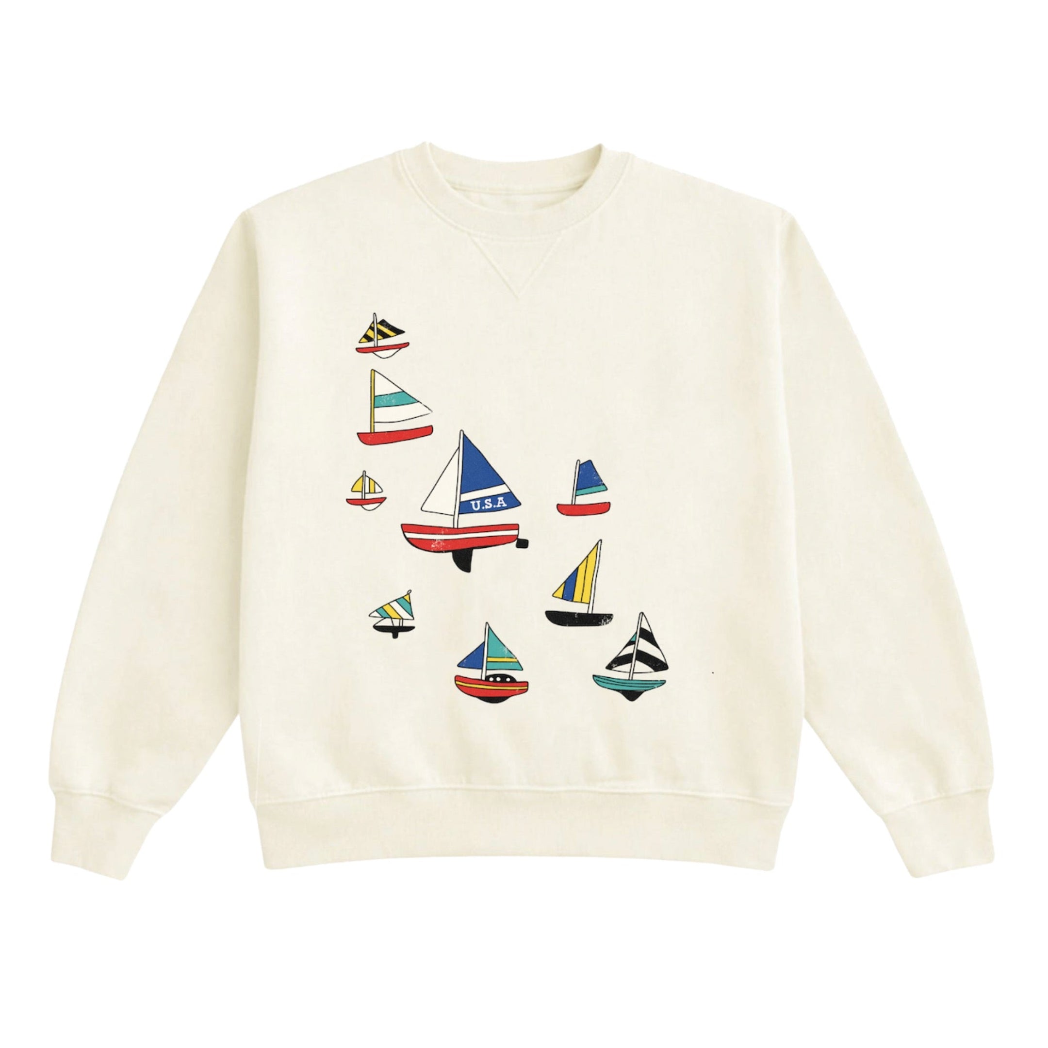 Cream-colored sweatshirt with sailboat designs on a white background