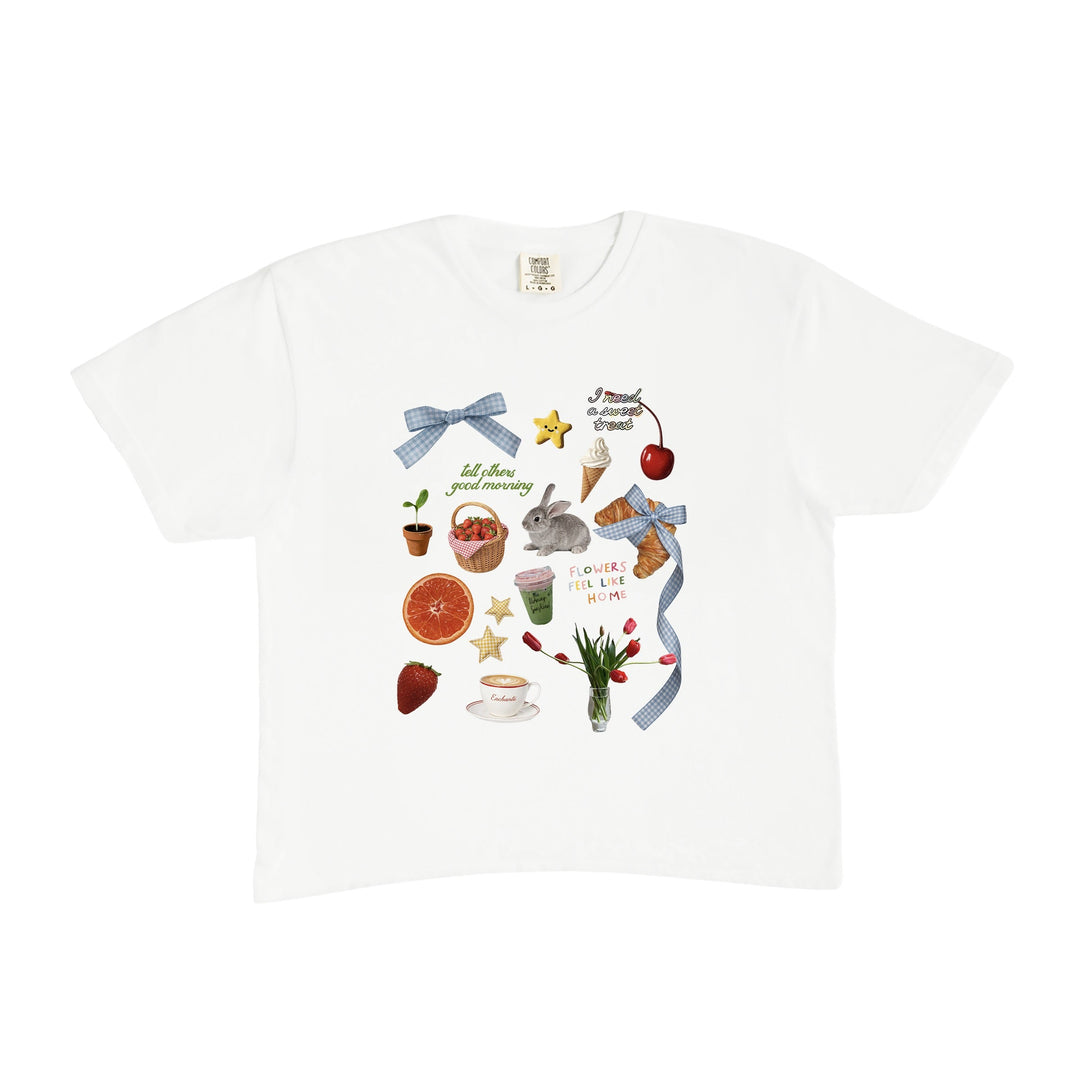 White t-shirt with colorful graphics on a white background