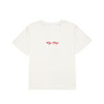 White t-shirt with red text on a white background