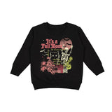 A black long-sleeve crewneck sweatshirt featuring a vintage-style Halloween graphic on the front with the text 'It's a Full Moon', a skeleton, a haunted house, a cat, and spooky illustrations in pink, red, green, and yellow.
