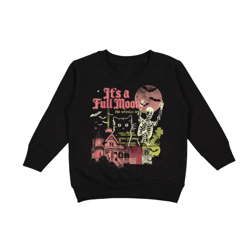 A black long-sleeve crewneck sweatshirt featuring a vintage-style Halloween graphic on the front with the text 'It's a Full Moon', a skeleton, a haunted house, a cat, and spooky illustrations in pink, red, green, and yellow.